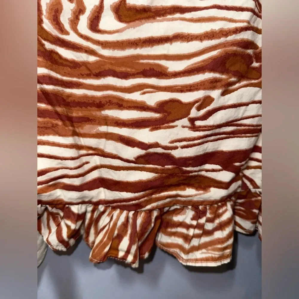 Anthropologie love the label Zebra Print Eyelet Puff sleeve smocked blouse S EUC